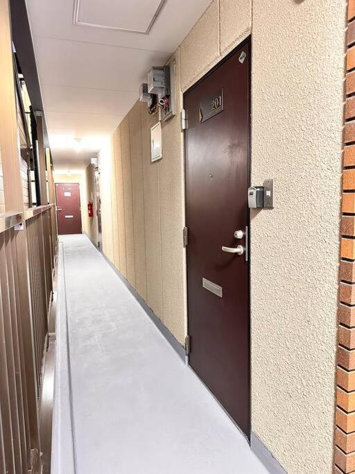 Apartment 303号室南海線駅2分の明るい和室専用キッチンとバスルーム付き荷物預り Osaka