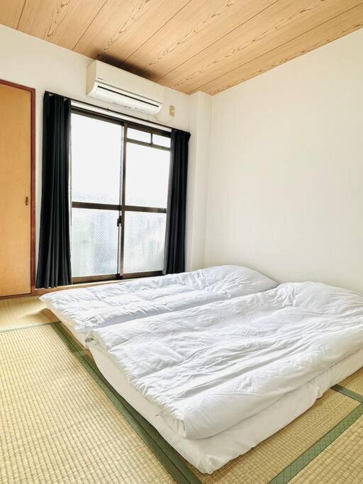 Apartment 303号室南海線駅2分の明るい和室専用キッチンとバスルーム付き荷物預り Osaka