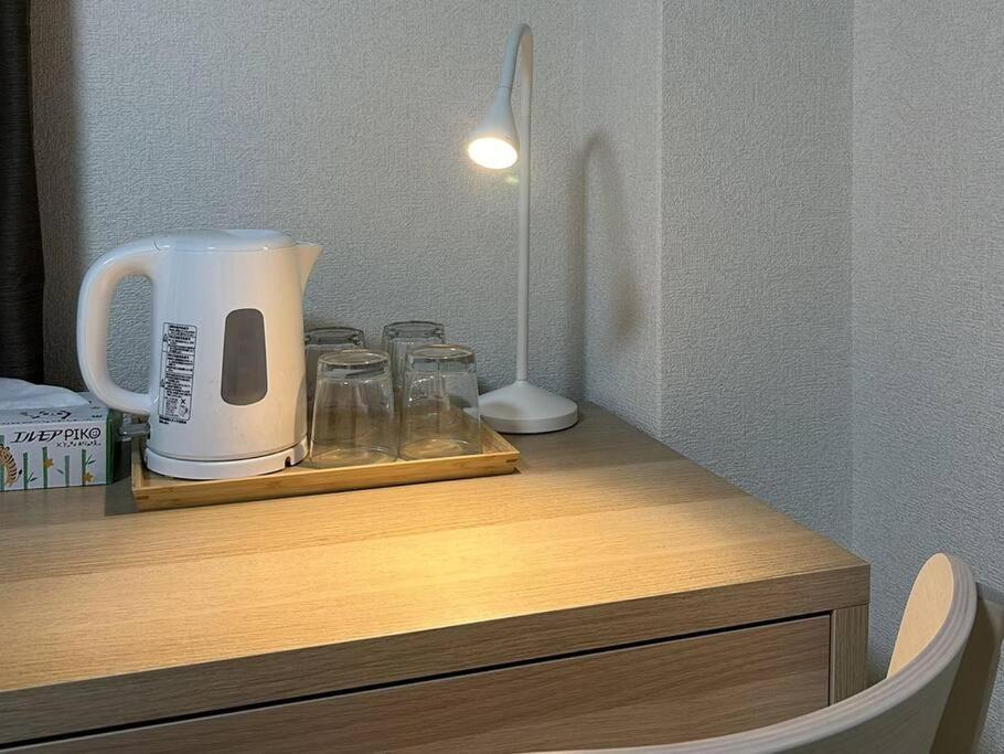303号室南海線駅2分の明るい和室専用キッチンとバスルーム付き荷物預り Apartment Osaka