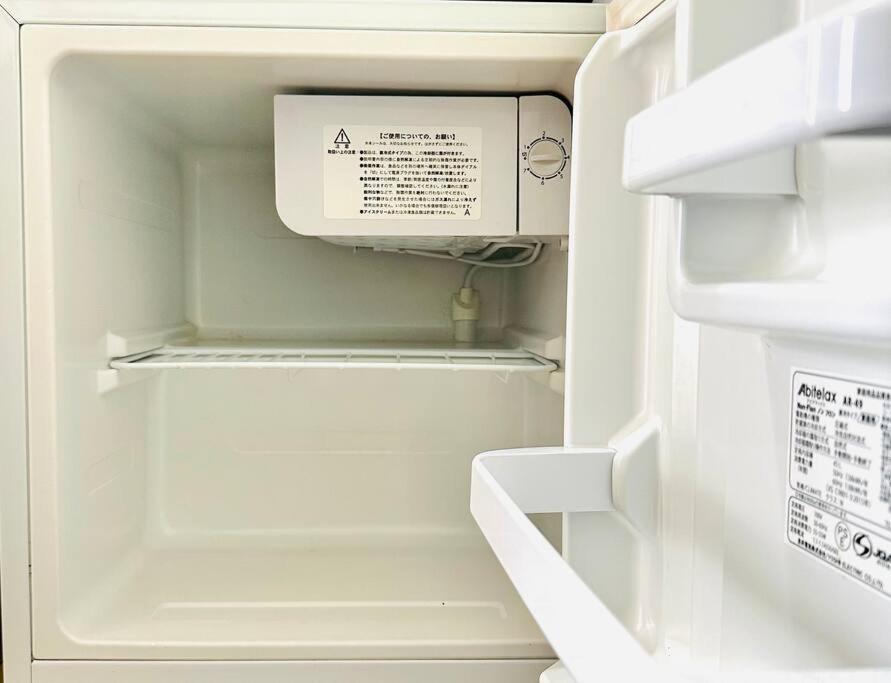303号室南海線駅2分の明るい和室専用キッチンとバスルーム付き荷物預り Apartment