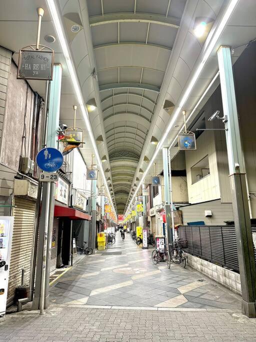 301号室駅2分格安和室民泊専用ミニキッチンとバスルーム付きアクセス抜群 Apartment Osaka