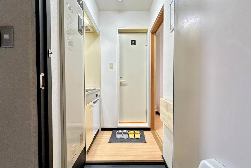105号室花園駅2分ツインベットルームミニキッチンと専用バスルーム付き Apartment Osaka
