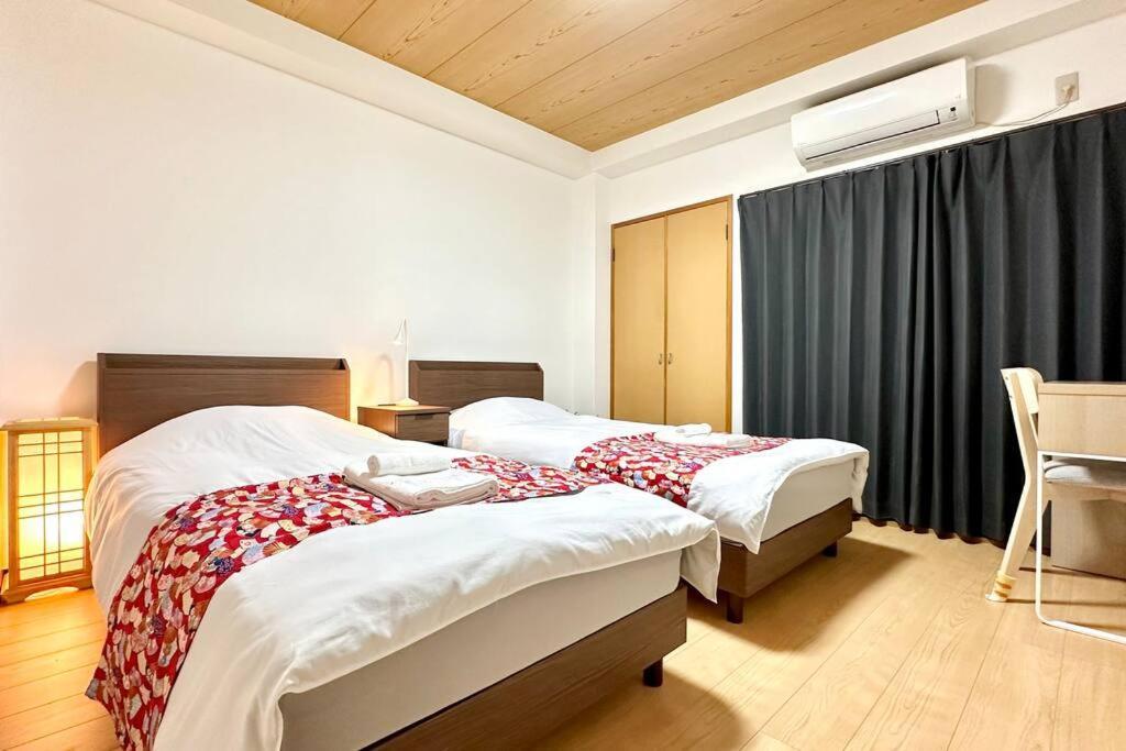 105号室花園駅2分ツインベットルームミニキッチンと専用バスルーム付き Apartment