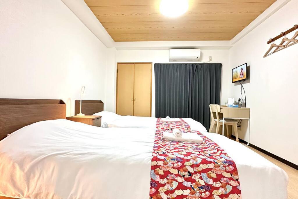 105号室花園駅2分ツインベットルームミニキッチンと専用バスルーム付き Apartment