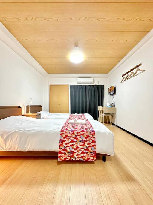 105号室花園駅2分ツインベットルームミニキッチンと専用バスルーム付き Apartment Osaka