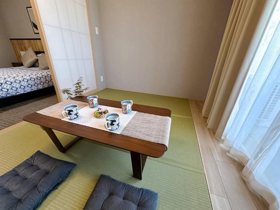 Apartment 40平!2卧室可住6人,徒步5分钟到达道顿堀,日本桥,黑门市场,8分钟到达心斋桥,难波,天王寺大阪城