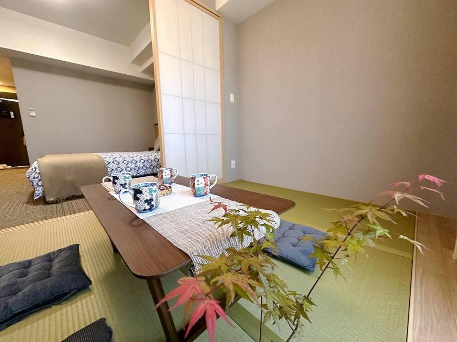 Apartment 40平!2卧室可住6人,徒步5分钟到达道顿堀,日本桥,黑门市场,8分钟到达心斋桥,难波,天王寺大阪城