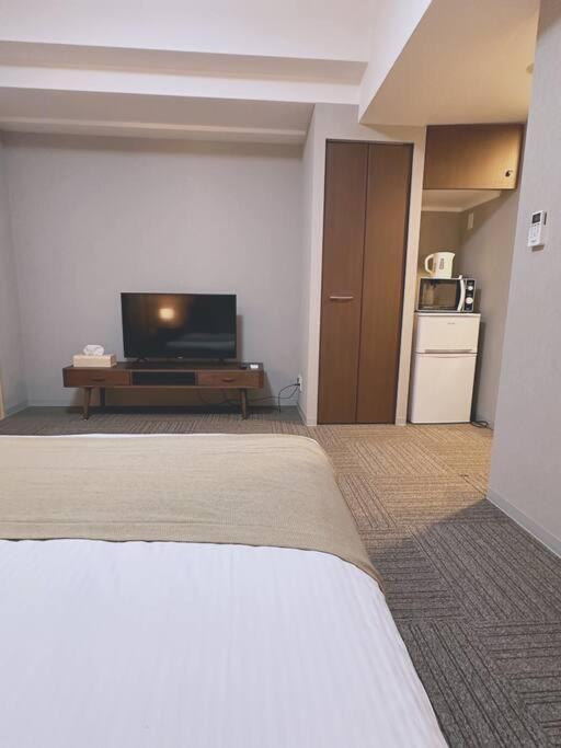 Apartment 40平!2卧室可住6人,徒步5分钟到达道顿堀,日本桥,黑门市场,8分钟到达心斋桥,难波,天王寺大阪城