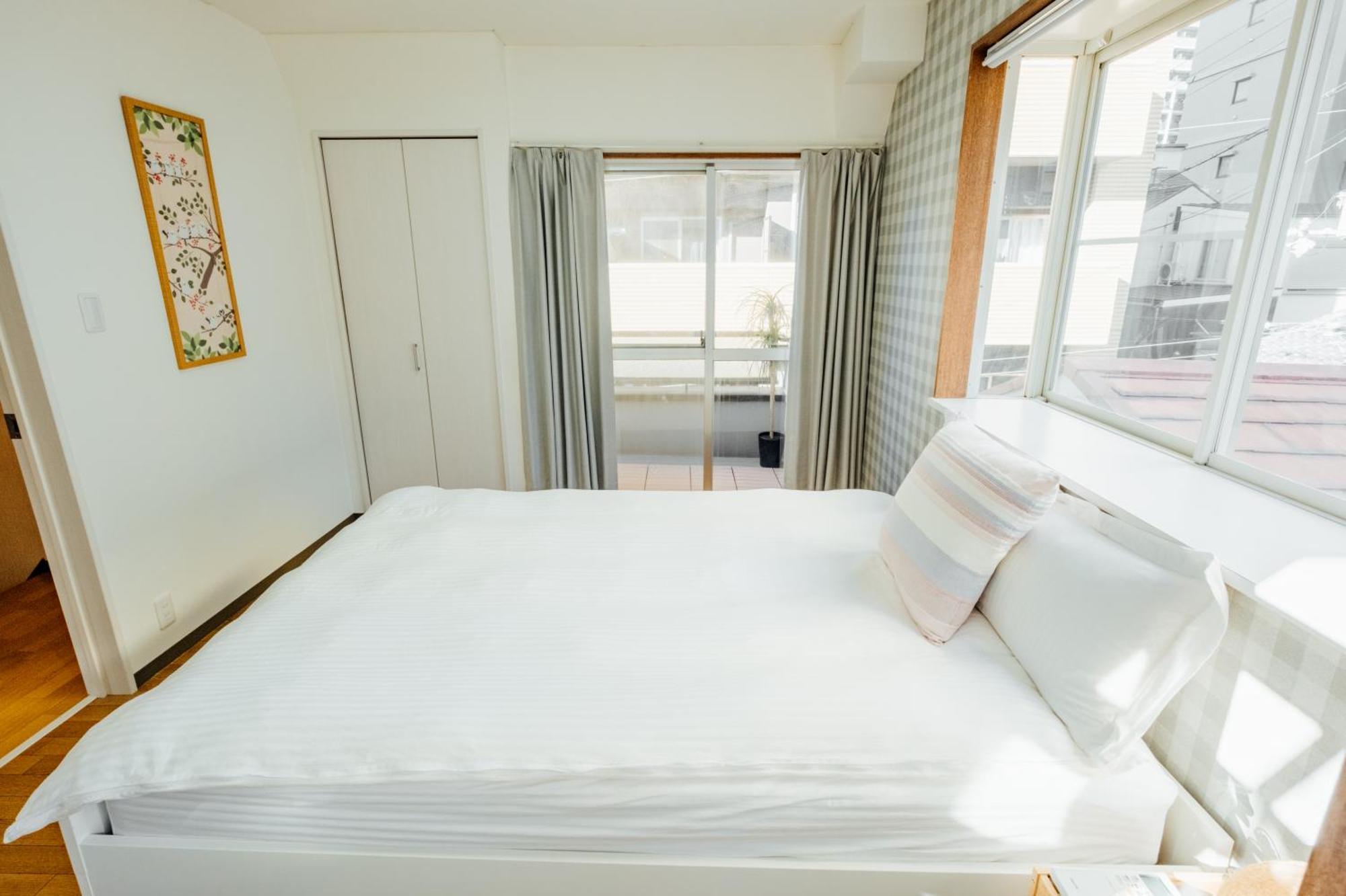 Holiday home New 敷津西兩層民宿 最多可容納13人 大国町站步行5分 交通便利