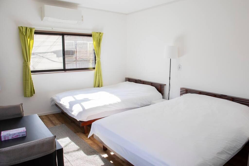 Apartment ゲストハウスわん花園北 Osaka
