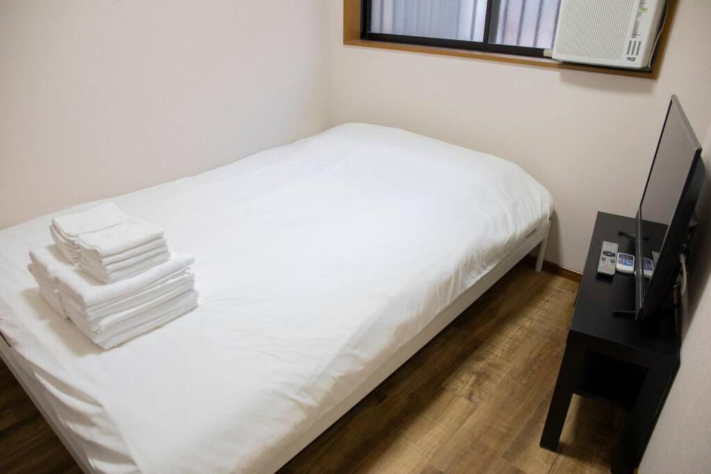 Apartment ゲストハウスわん花園北 Osaka