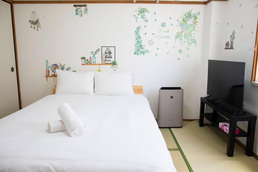ゲストハウスわん弁天町 Apartamento Osaka