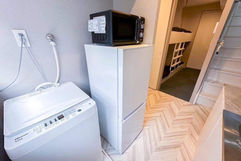 西九条 Guest House! Usjまで電車で5分!西九条駅徒歩3分!最大10人宿泊可能!デザイナーズハウス!2階建て一軒家貸切 Villa