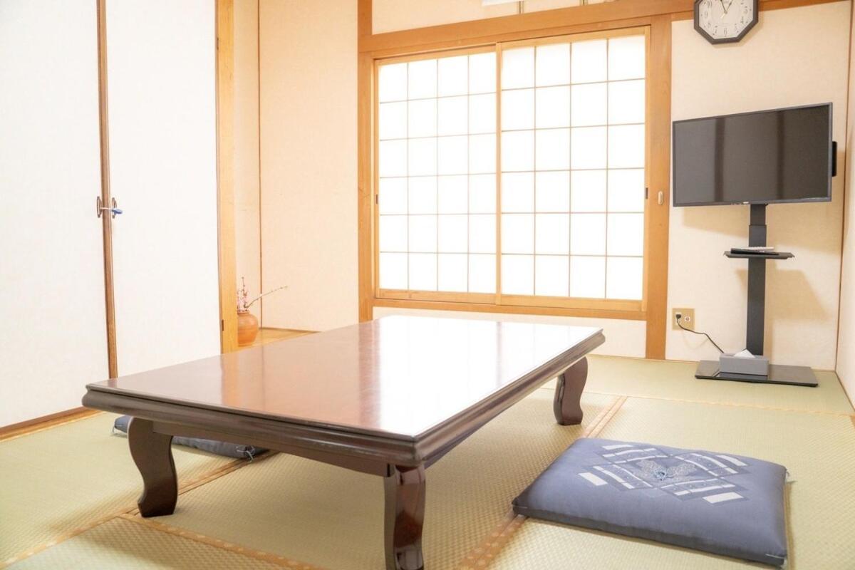 団,最大16名,レンタルサイクル無料,usjまで好アクセスの3階建て Apartment