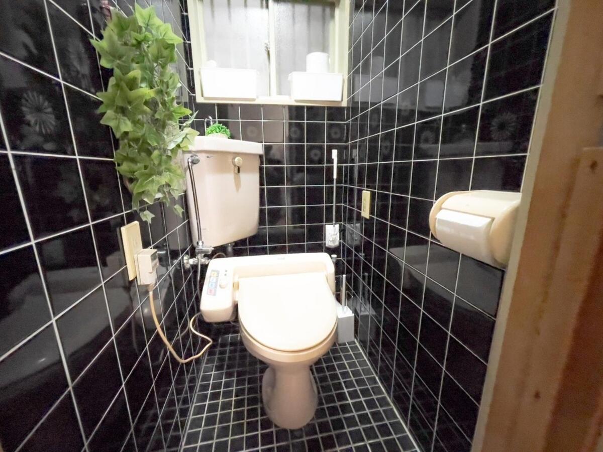団,最大16名,レンタルサイクル無料,usjまで好アクセスの3階建て Apartment
