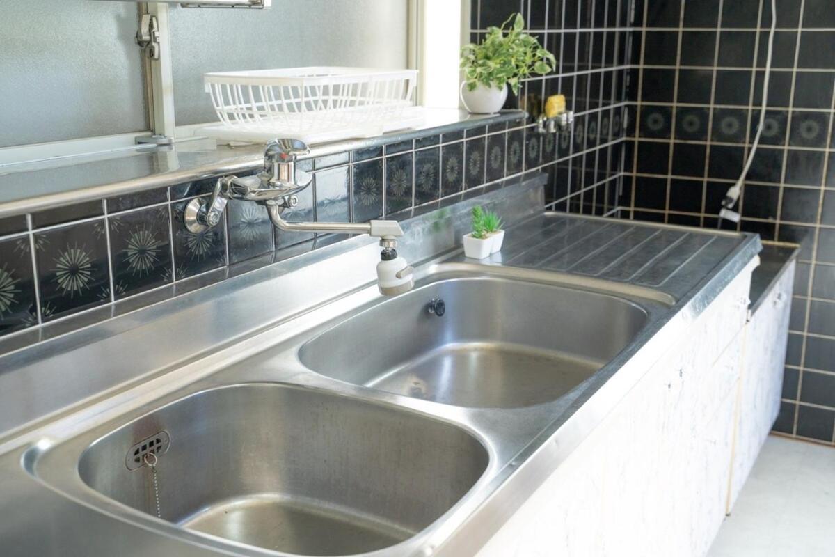 Apartment 団,最大16名,レンタルサイクル無料,usjまで好アクセスの3階建て
