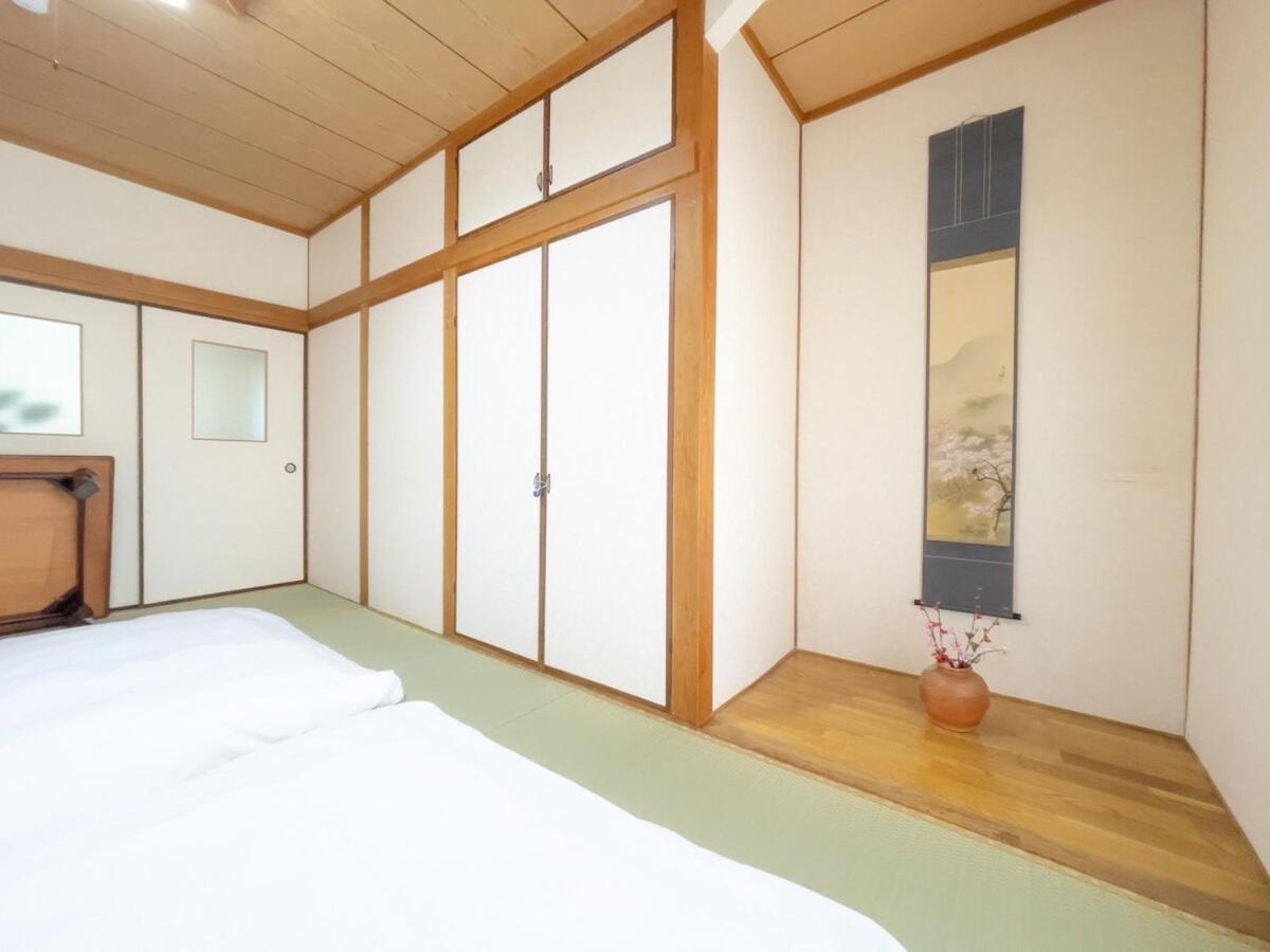 団,最大16名,レンタルサイクル無料,usjまで好アクセスの3階建て Apartment