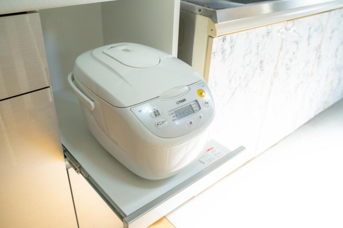 Apartment 団,最大16名,レンタルサイクル無料,usjまで好アクセスの3階建て Osaka