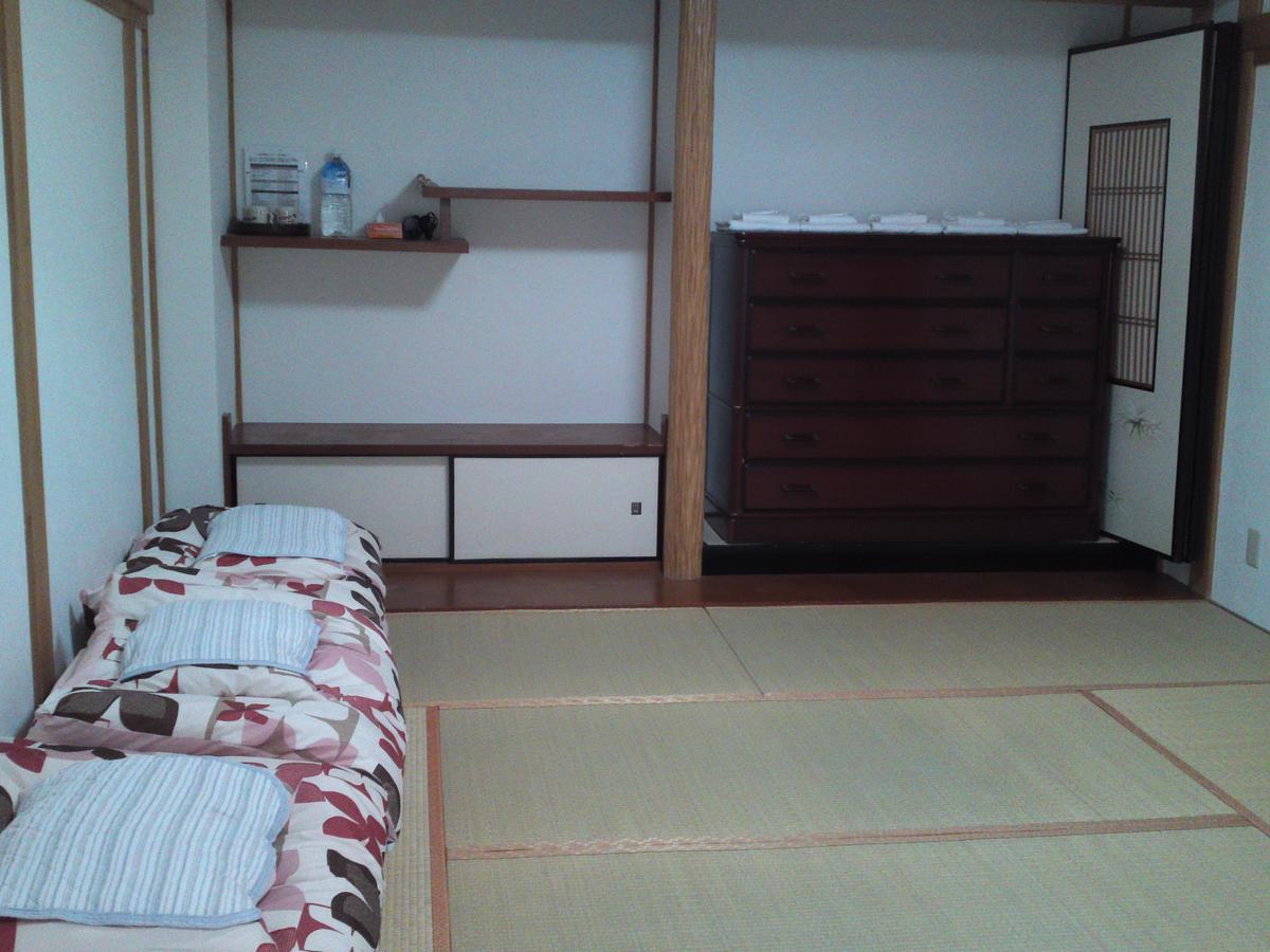 Kuma House Guest house *