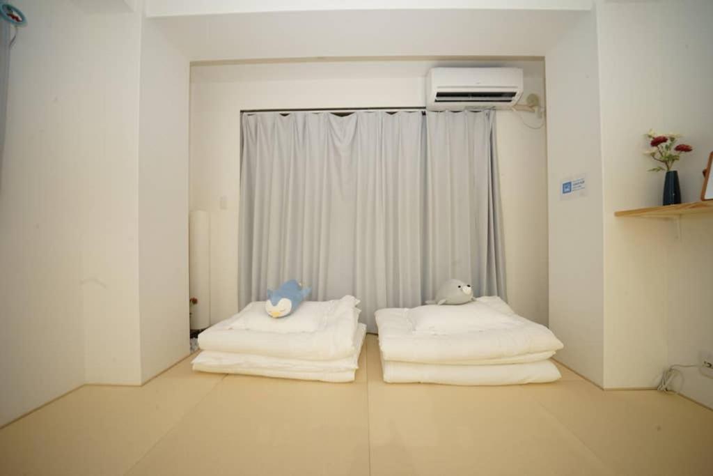 悠悠美宿 肥后桥21分贝 地铁站步行行5分钟 直达难波心斋桥5分钟内 独立卧室有厨房 肥后桥高级公寓有电梯 Osaka