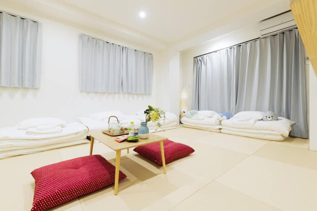 悠悠美宿 肥后桥21分贝 地铁站步行行5分钟 直达难波心斋桥5分钟内 独立卧室有厨房 肥后桥高级公寓有电梯 Osaka