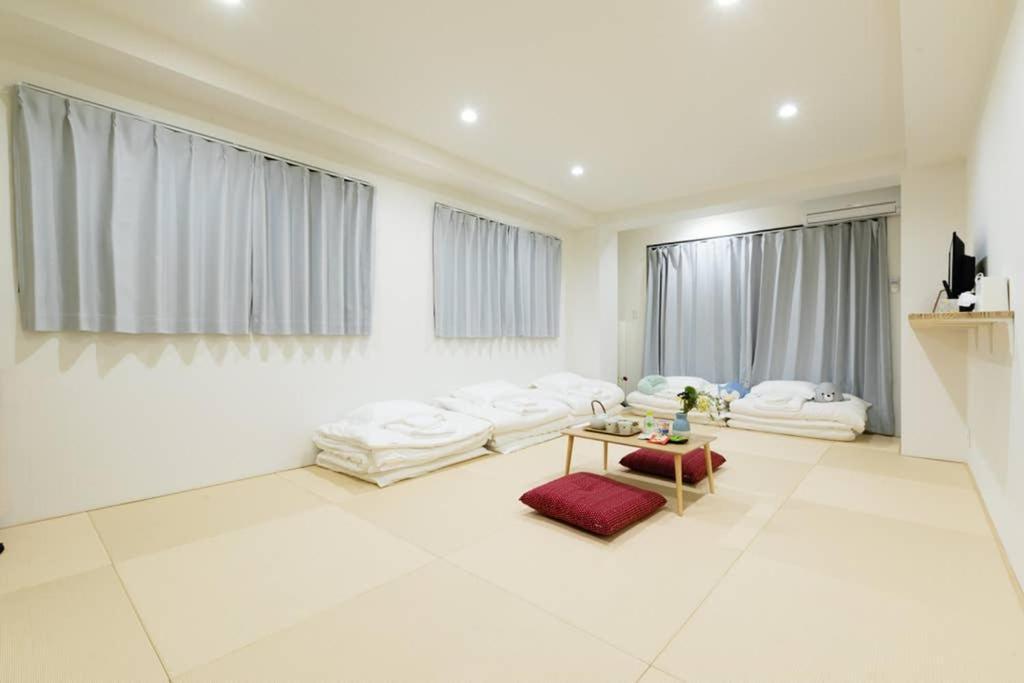 悠悠美宿 肥后桥21分贝 地铁站步行行5分钟 直达难波心斋桥5分钟内 独立卧室有厨房 肥后桥高级公寓有电梯 Osaka