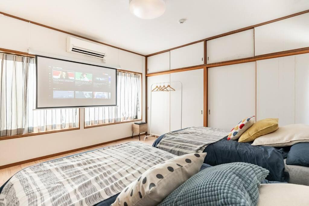 ｕｓｊ,万博,梅田への交通抜群,ファミリーで安心のguesthouse-泉-