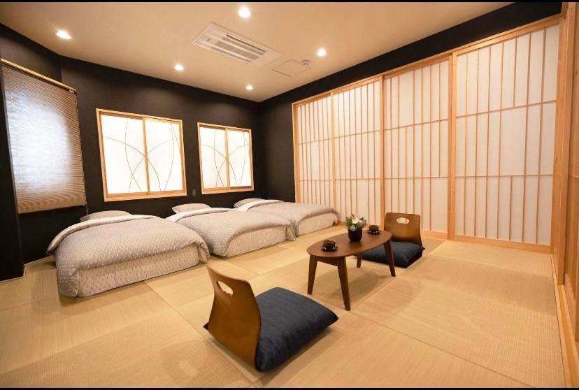 He Men Boutique Hotel: Market Adjacent, Cultural Attractions Nearby Osaka