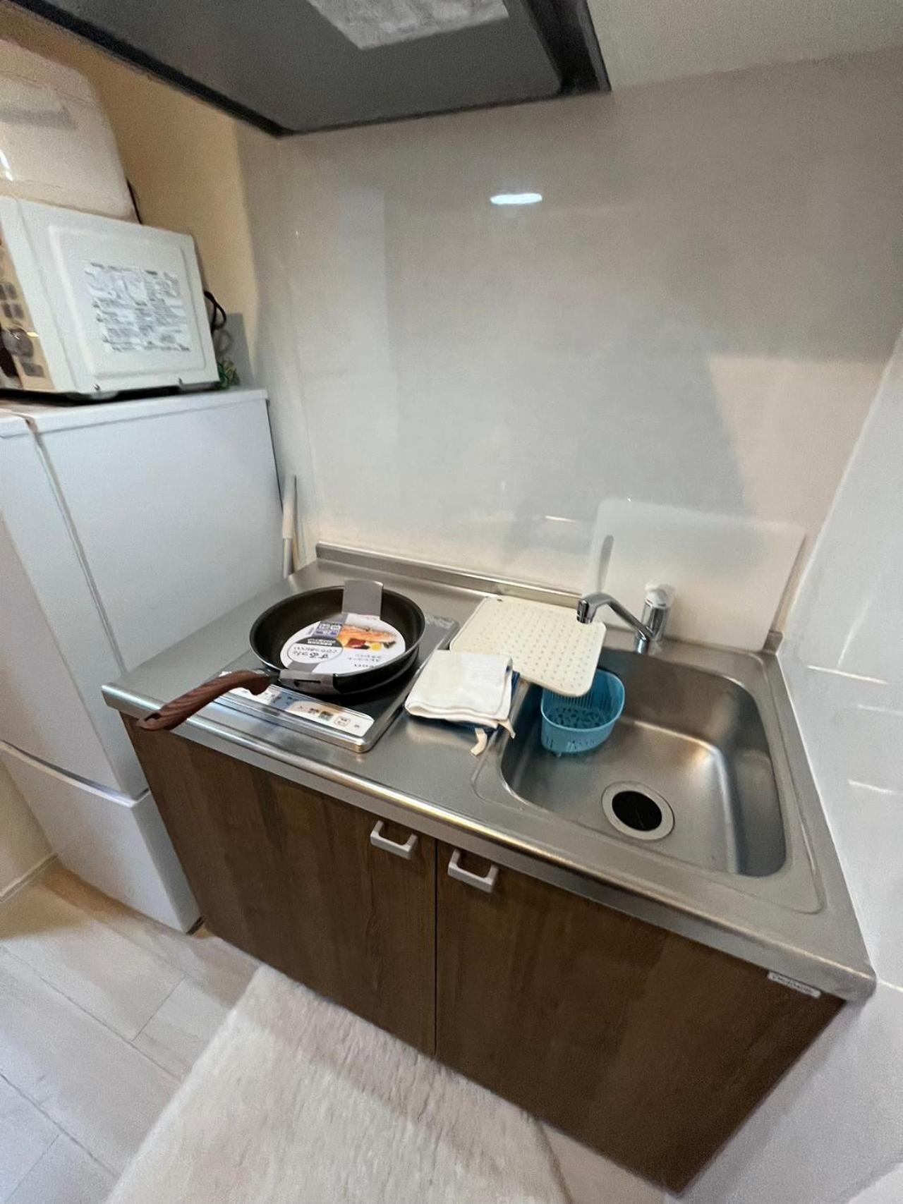 Apartment Sun二番館101室