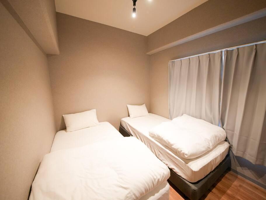 Apartment Tasoneurbanstayosaka なんば日本橋南不夜城704 *