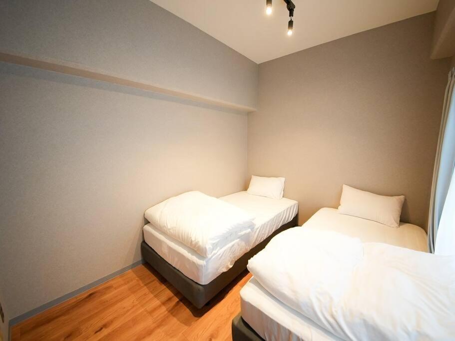 Apartment Tasoneurbanstayosaka なんば日本橋南不夜城704 Osaka