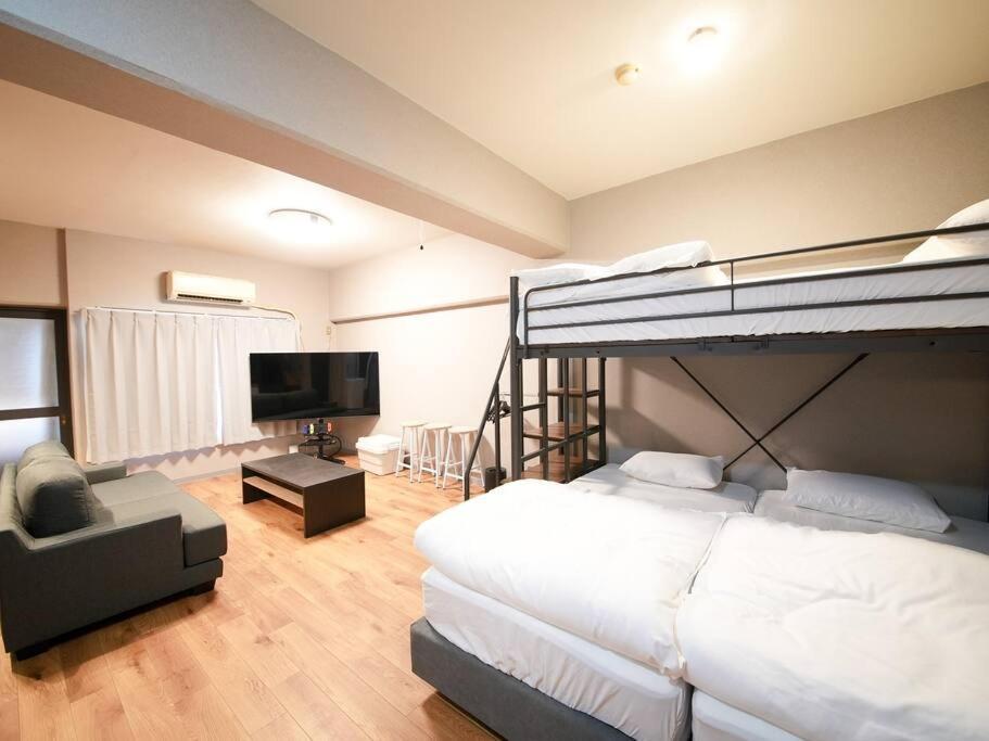 Tasoneurbanstayosaka なんば日本橋南不夜城704 Apartment