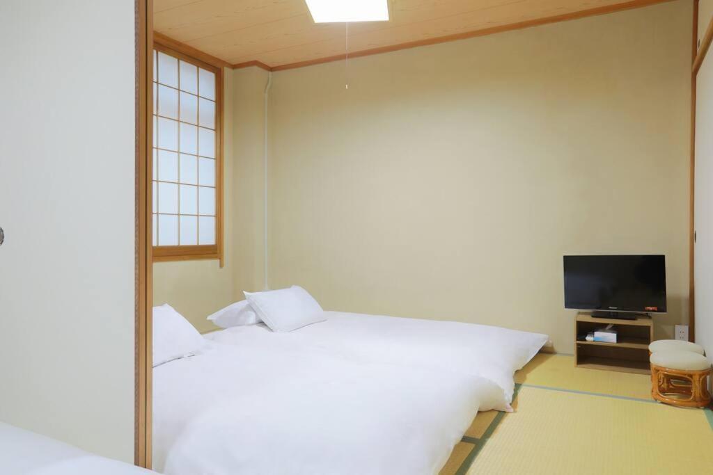 道頓堀民泊＆mini浮世絵美術館、道頓堀真ん中、心斎橋、家族旅行、family Trip 401 Apartment Osaka