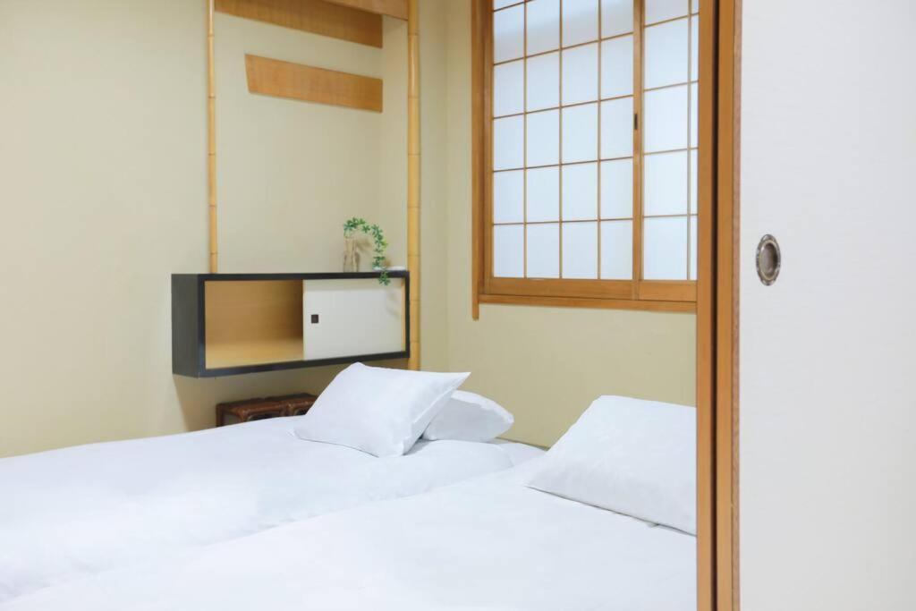 道頓堀民泊＆mini浮世絵美術館、道頓堀真ん中、心斎橋、家族旅行、family Trip 401 Apartment