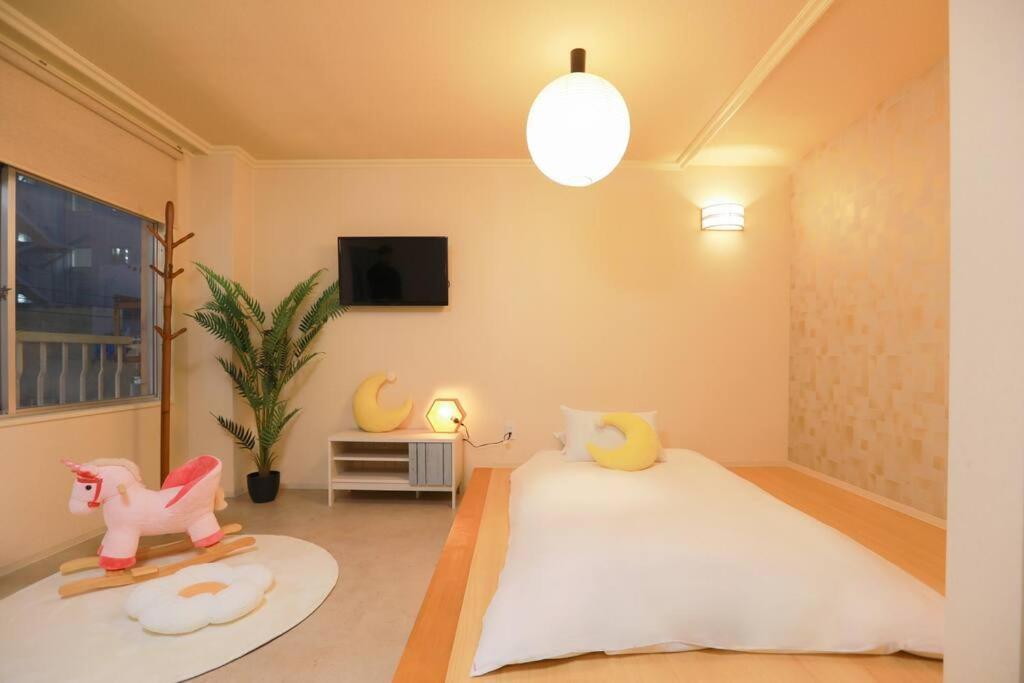道頓堀民泊＆mini浮世絵美術館、道頓堀真ん中、心斎橋、家族旅行、family Trip 401 Apartment