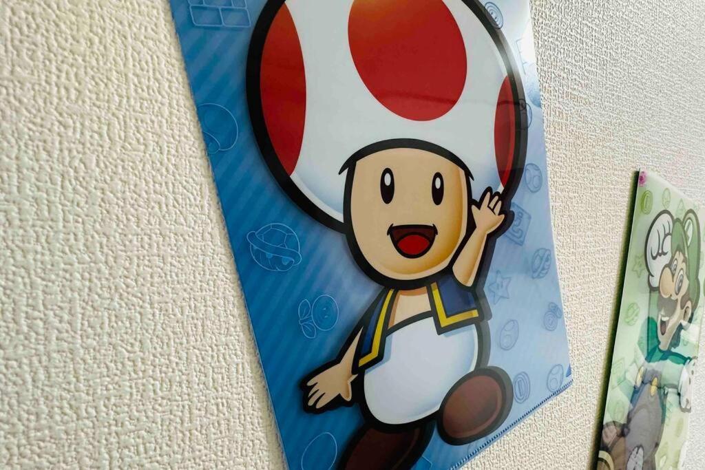 303黒門市場すぐ30秒!道頓堀まで徒歩8分!でんでんタウン徒歩3分!通天閣徒歩9分!観光に最高! Apartment