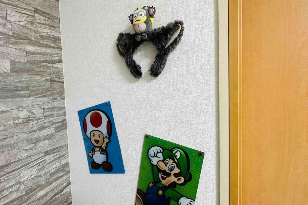 303黒門市場すぐ30秒!道頓堀まで徒歩8分!でんでんタウン徒歩3分!通天閣徒歩9分!観光に最高! Apartment Osaka