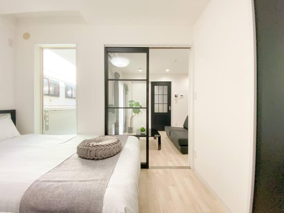 Residential Glitter Usjまで1駅5分 Casa de hóspedes