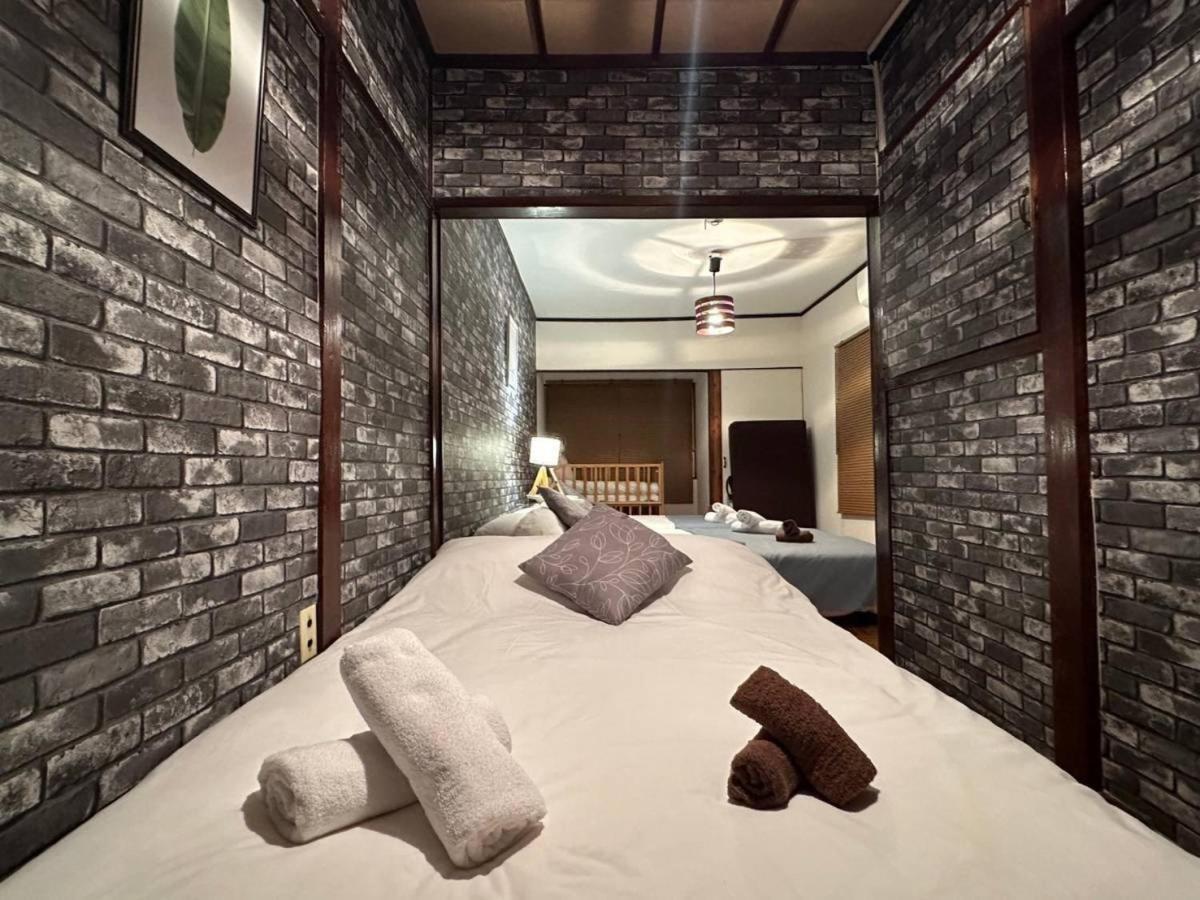 Apartment 大阪中心地にステイ！無料駐車場付き物件！最大7名宿泊可能、1dk戸建を一棟貸切！無料wifi付き！