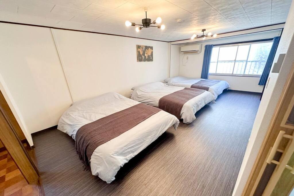 Villa 大正 Guest House! Usjと心斎橋へアクセス抜群!京セラドーム近くの大正駅徒歩5分!12人宿泊可能!一軒家貸切! Osaka