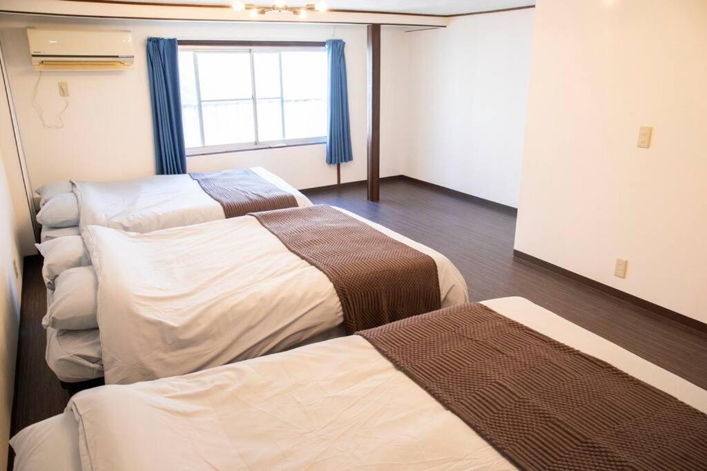 大正 Guest House! Usjと心斎橋へアクセス抜群!京セラドーム近くの大正駅徒歩5分!12人宿泊可能!一軒家貸切! * Osaka