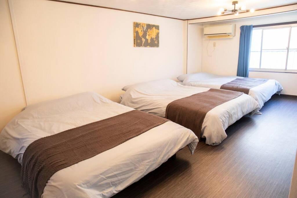 大正 Guest House! Usjと心斎橋へアクセス抜群!京セラドーム近くの大正駅徒歩5分!12人宿泊可能!一軒家貸切! *