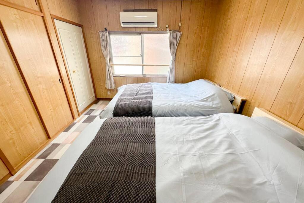 大正 Guest House! Usjと心斎橋へアクセス抜群!京セラドーム近くの大正駅徒歩5分!12人宿泊可能!一軒家貸切!