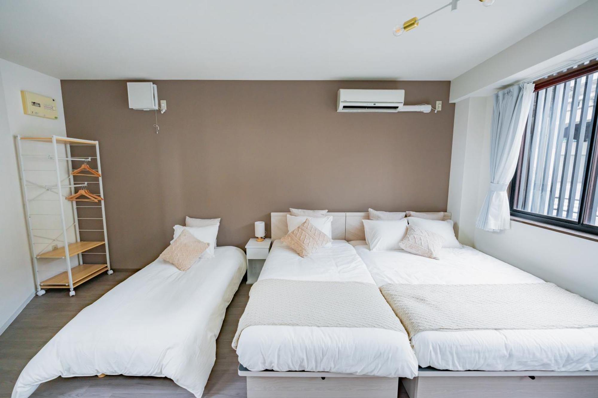 難波まで8分 最大10人 シャワー2箇所 3階建貸し切り Apartment Osaka
