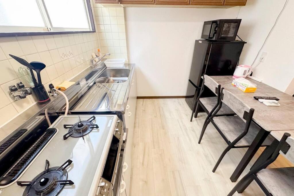 ゲストハウスわん弁天町 Apartment