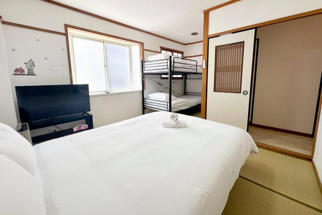 ゲストハウスわん弁天町 Apartment *