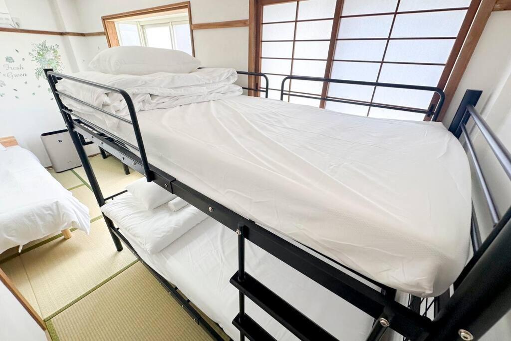 ゲストハウスわん弁天町 Apartment