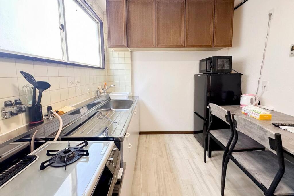 ゲストハウスわん弁天町 Apartment