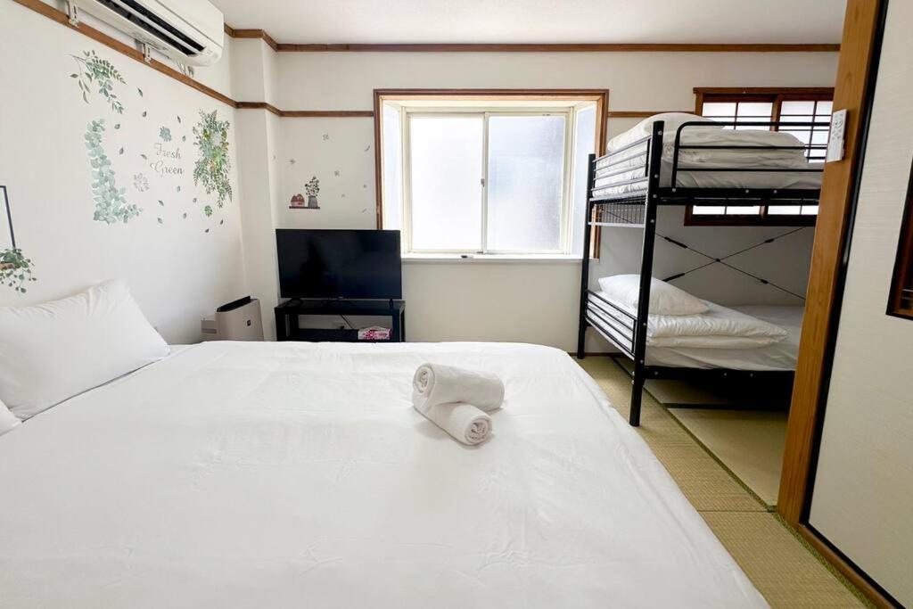 ゲストハウスわん弁天町 Apartment