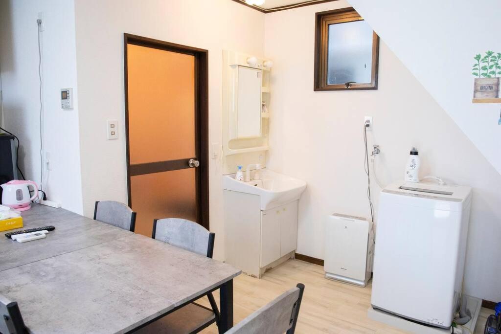 Apartment ゲストハウスわん弁天町